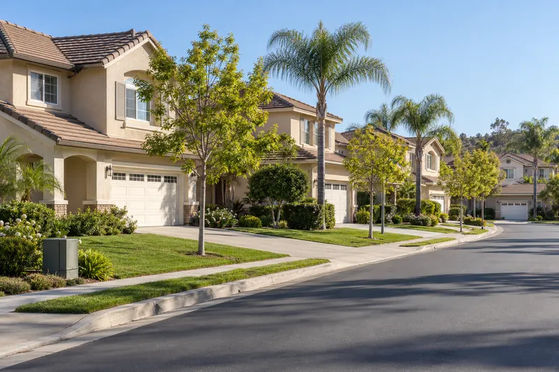 Buena Park, California: a planned-community street of two-story stucco homes with tile roofs in Orange County